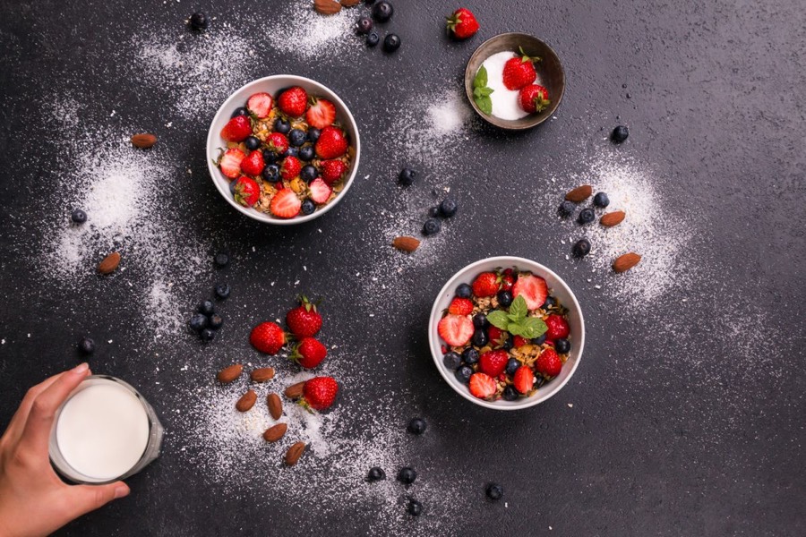 A bowl of food on a dark table